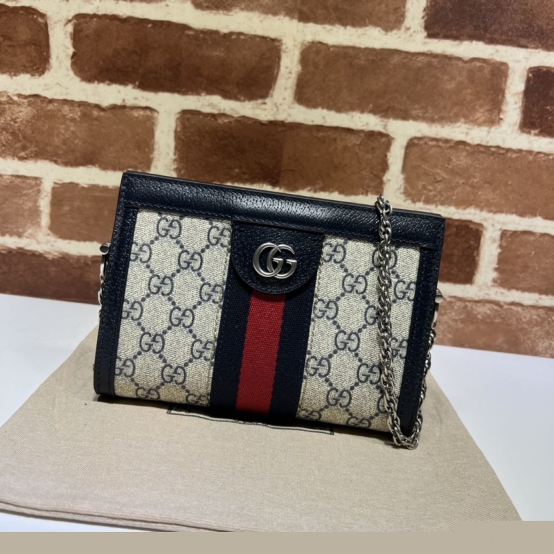 G*u*i clutch bags
